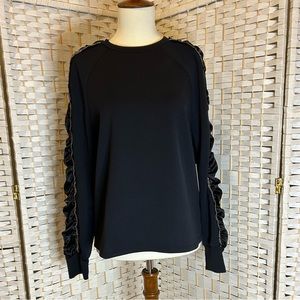Long sleeve black top with satin and sequin detail sleeves